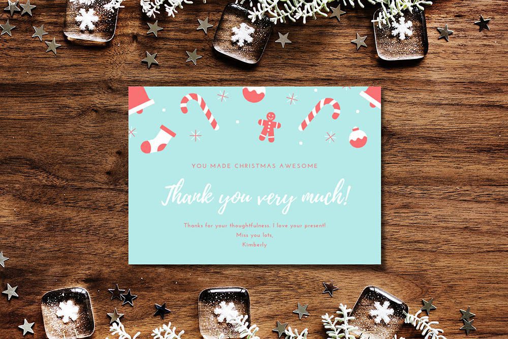 christmas-greeting-card-mockup-generator-on-wood-desk