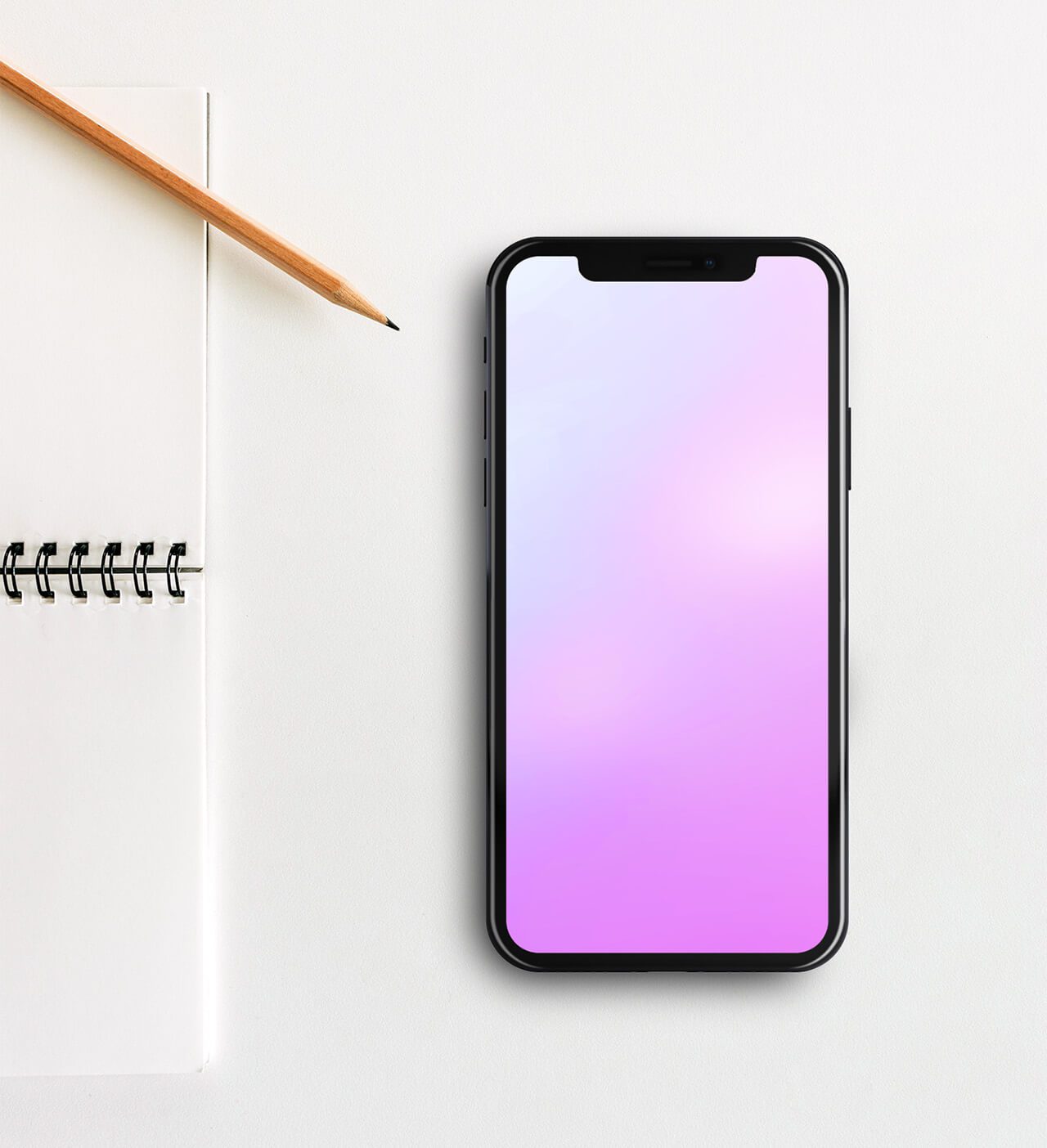 10-iphone-xs-on-desk-mockup-photoshop