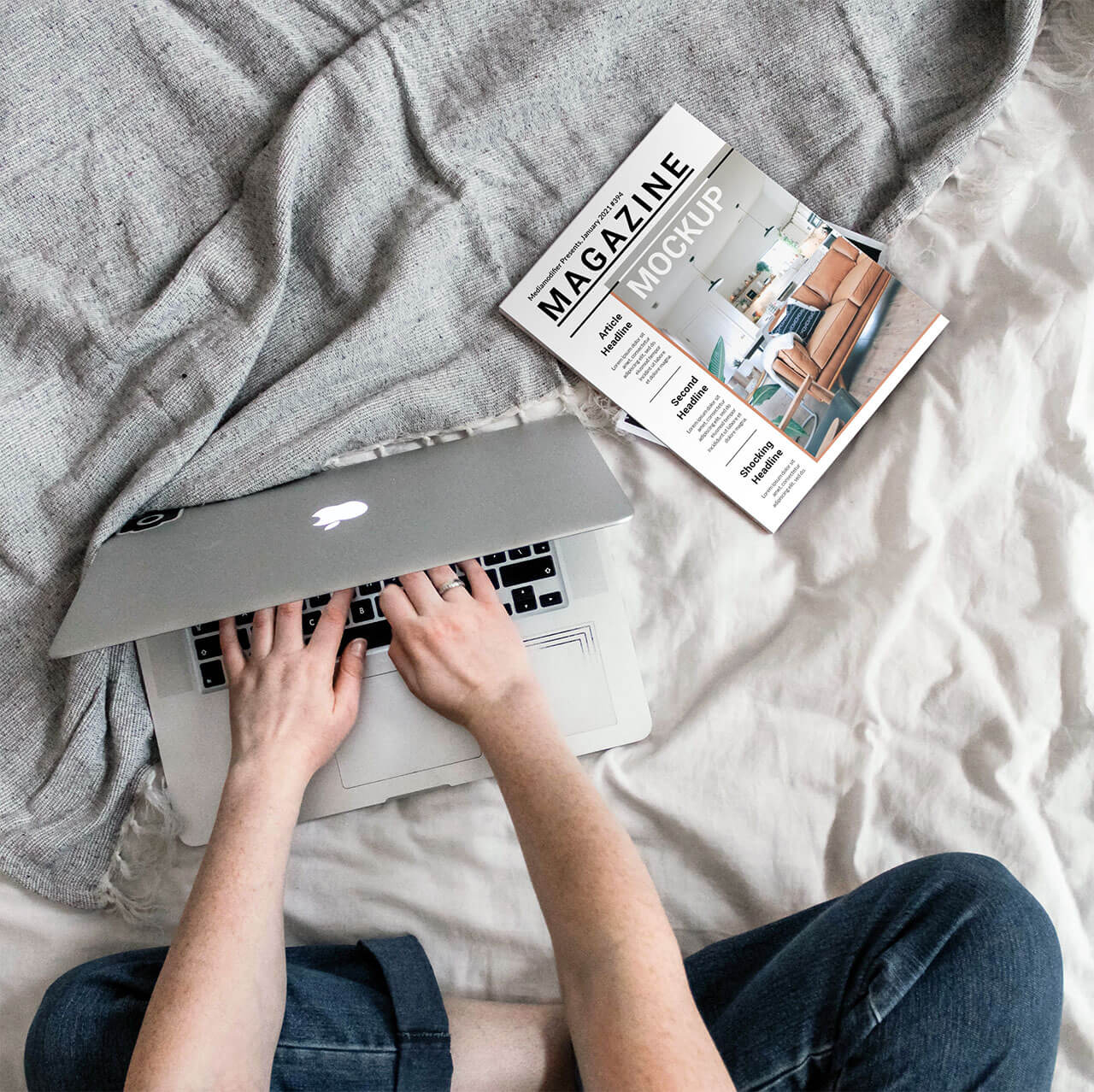 24-magazine-cover-on-bed-mockup-maker