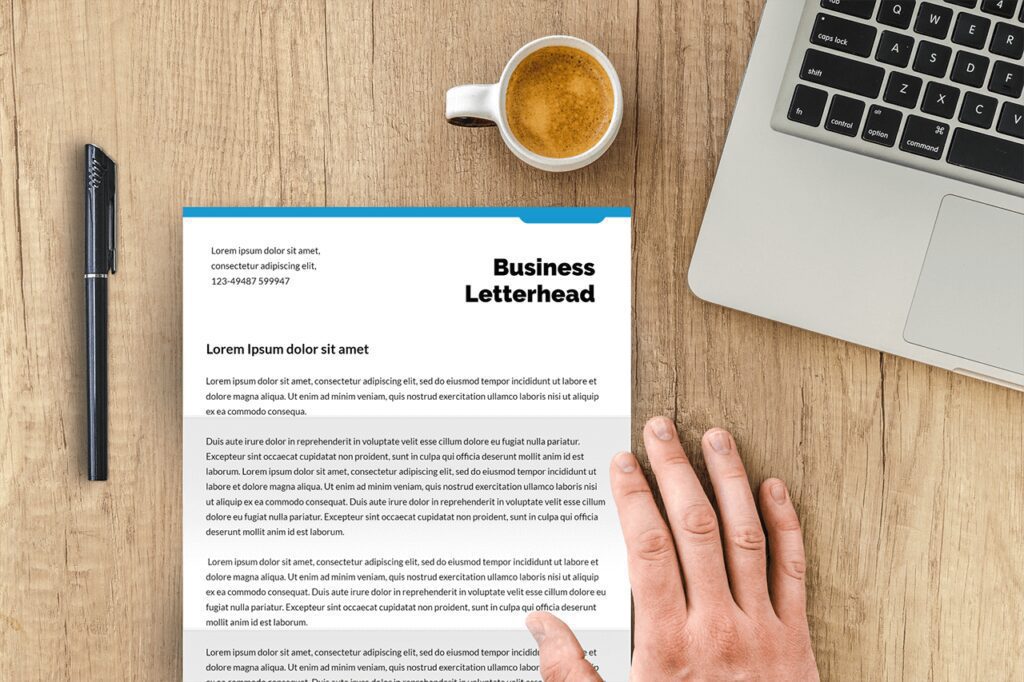 35-business-paper-letterhead-on-desk-mockup-generator