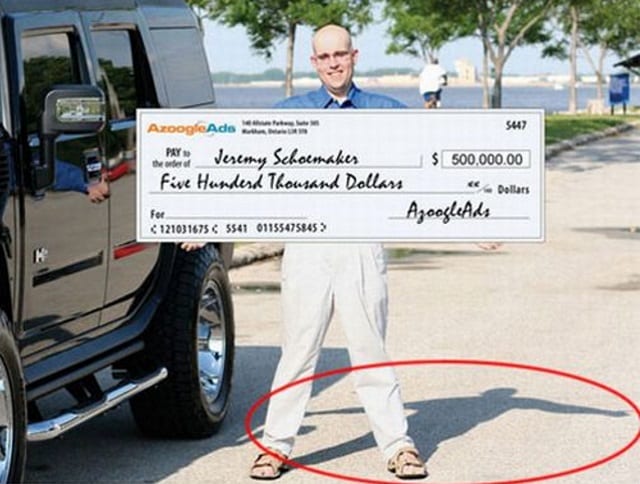 Man holding cheque photoshop fail