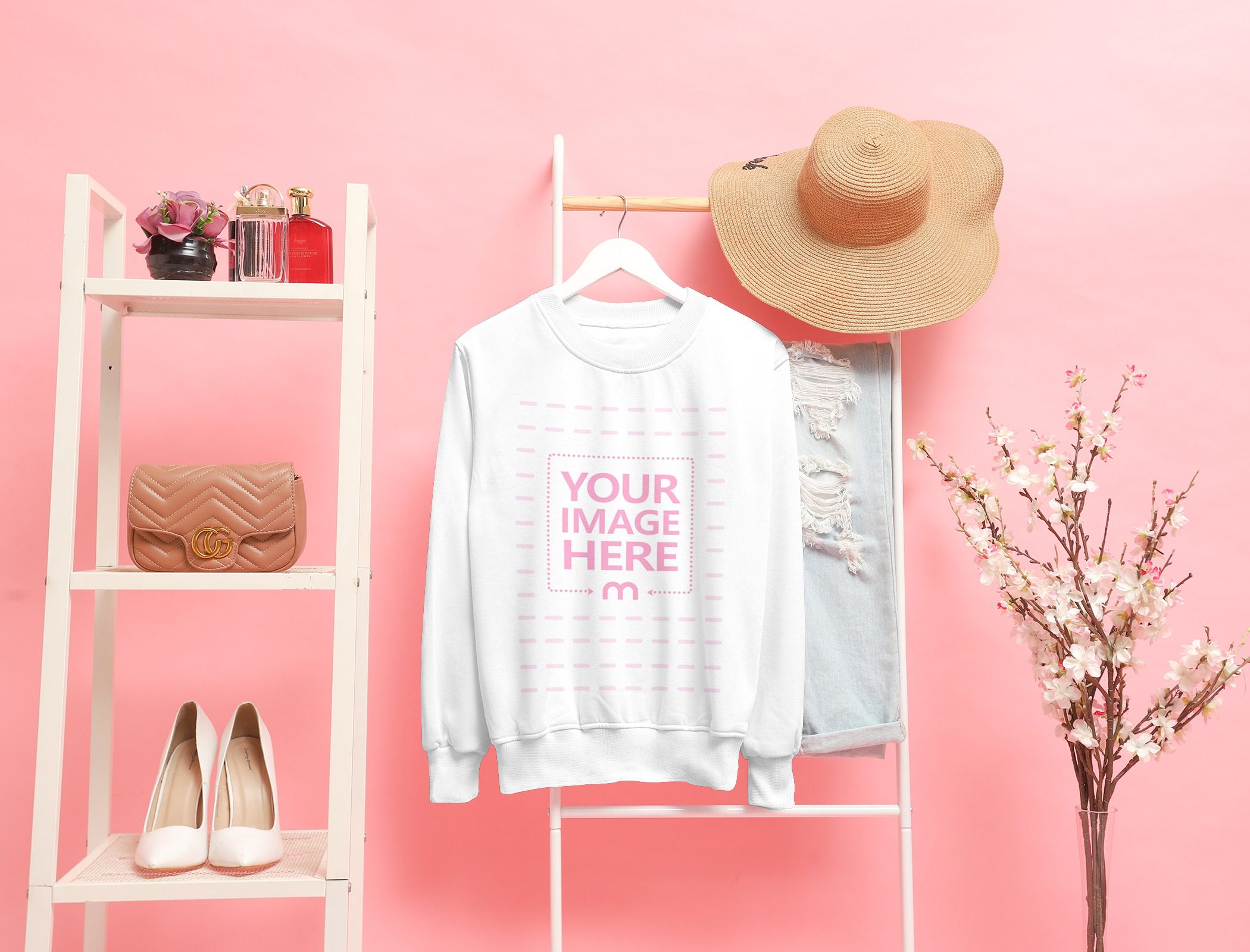 Customizable Mockup of a Crewneck Sweatshirt Hanged on a Stair With Pink Background
