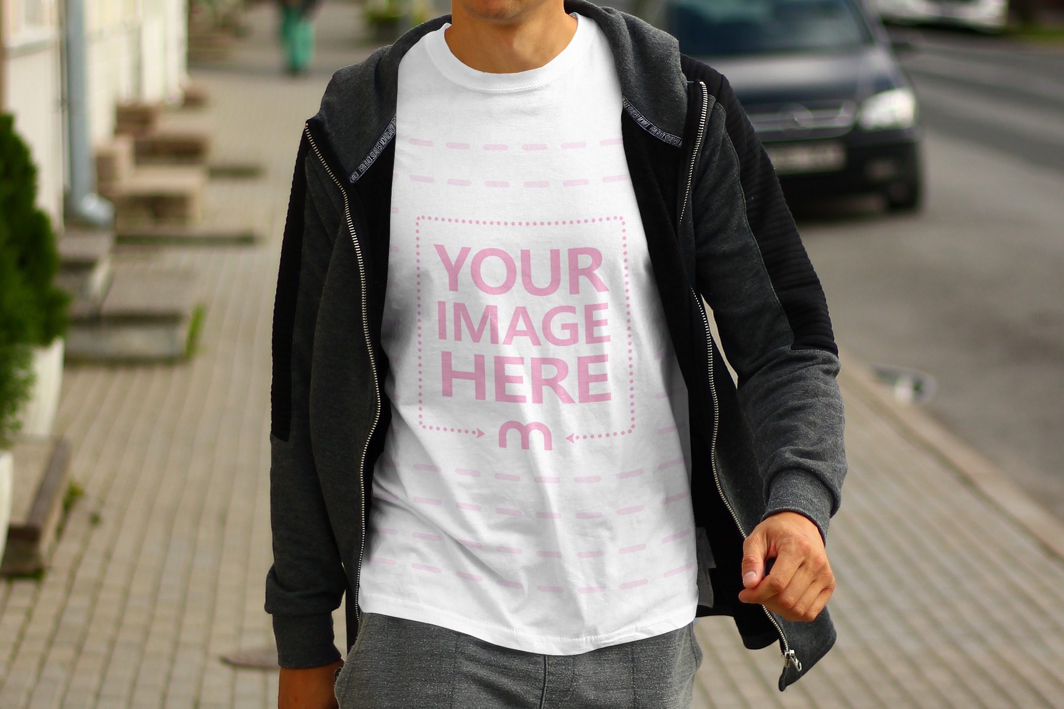 t shirt mockup generator template with a young man walking on the street