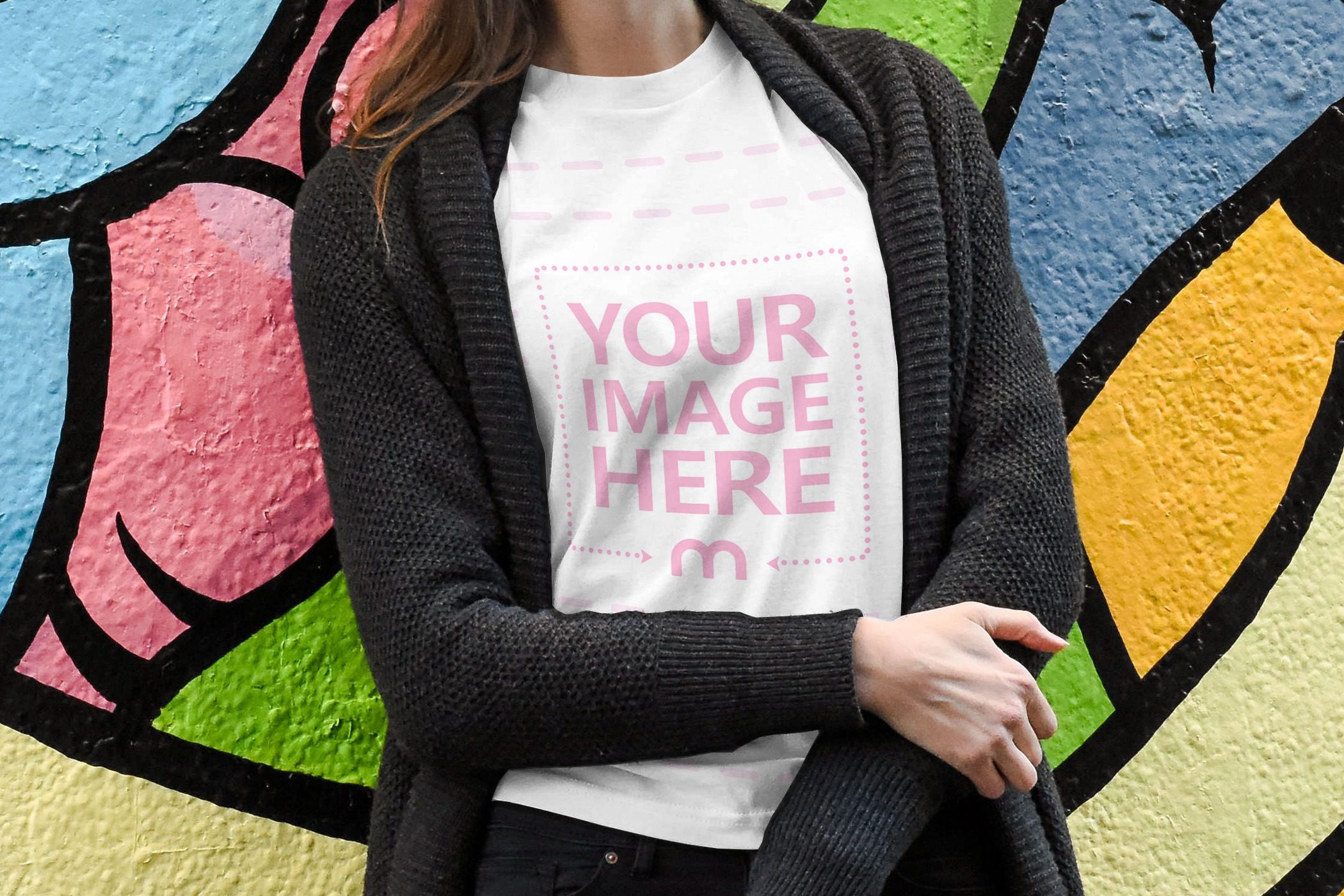 woman wearing blank t shirt mockup on grunge graffiti background