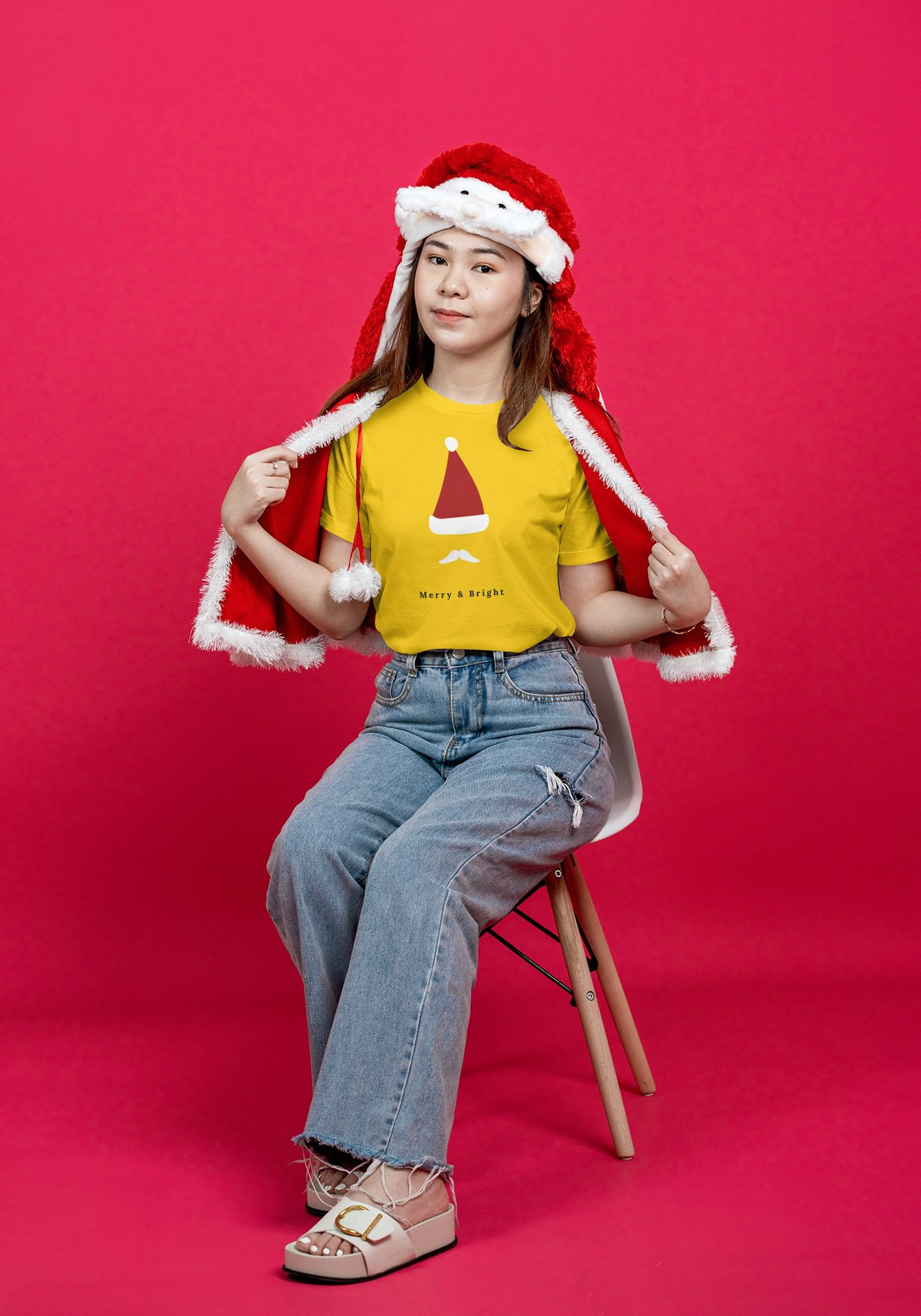 Christmas T-Shirt PSD Mockup of a Santa Hood Woman | Mediamodifier